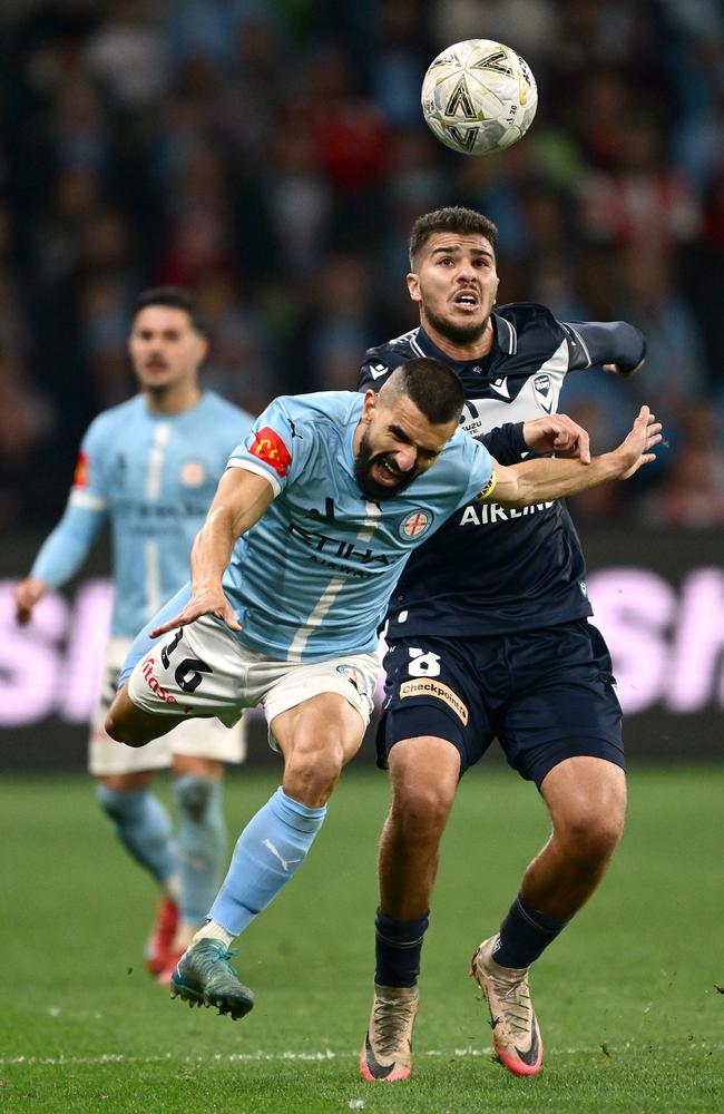 City’s Aziz Behich and Victory’s Zinadine Machach compete for the ball. Picture: Getty Images