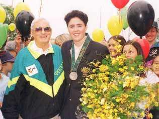 Stan Tilley in 1996 with Olympic medal winner Petria Thomas in Mullumbimby. 