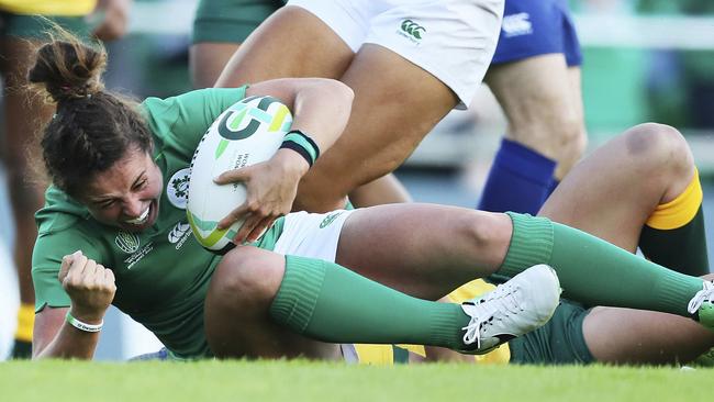 Ireland's Larissa Muldoon crashes over for her country’s first try.