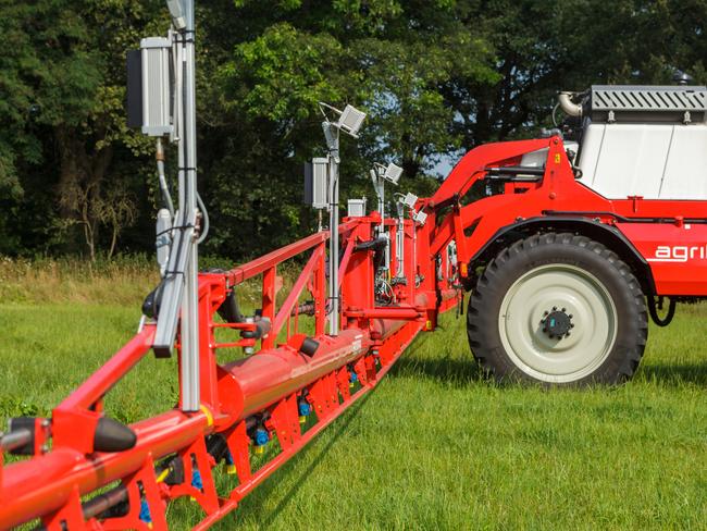 Keeping watch: Smart cameras mounted on the spray booms identify what stays and what goes.