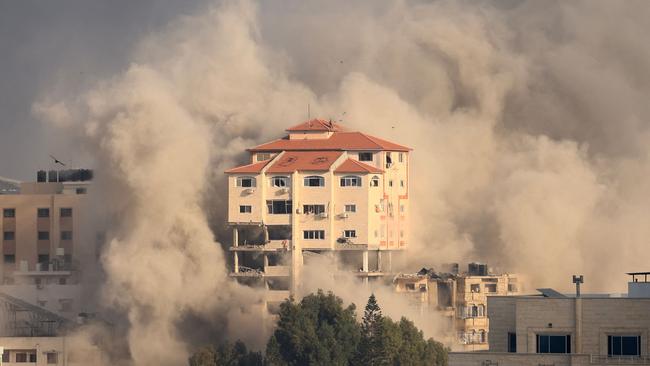 Smoke plumes billow following Israeli bombardment in Gaza City on October 11, 2023 on the fifth day of fighting between Israel and the Hamas movement. Photo by MAHMUD HAMS / AFP