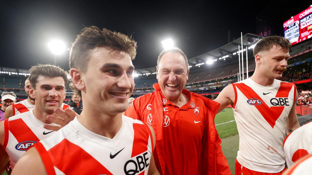 Sydney coach John Longmire (second from right) was thrilled with his team’s win over reigning premier Melbourne. Picture: Getty Images