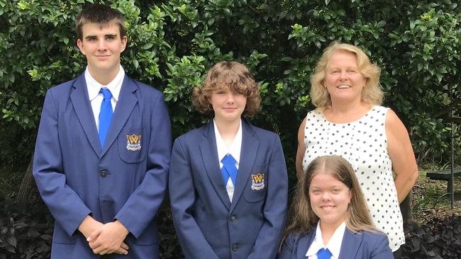 Woodford P-10 State School captains Joshua Strange, Sash Morris and Emma Isdale with principal Ronnie Hill. Photo – contributed.