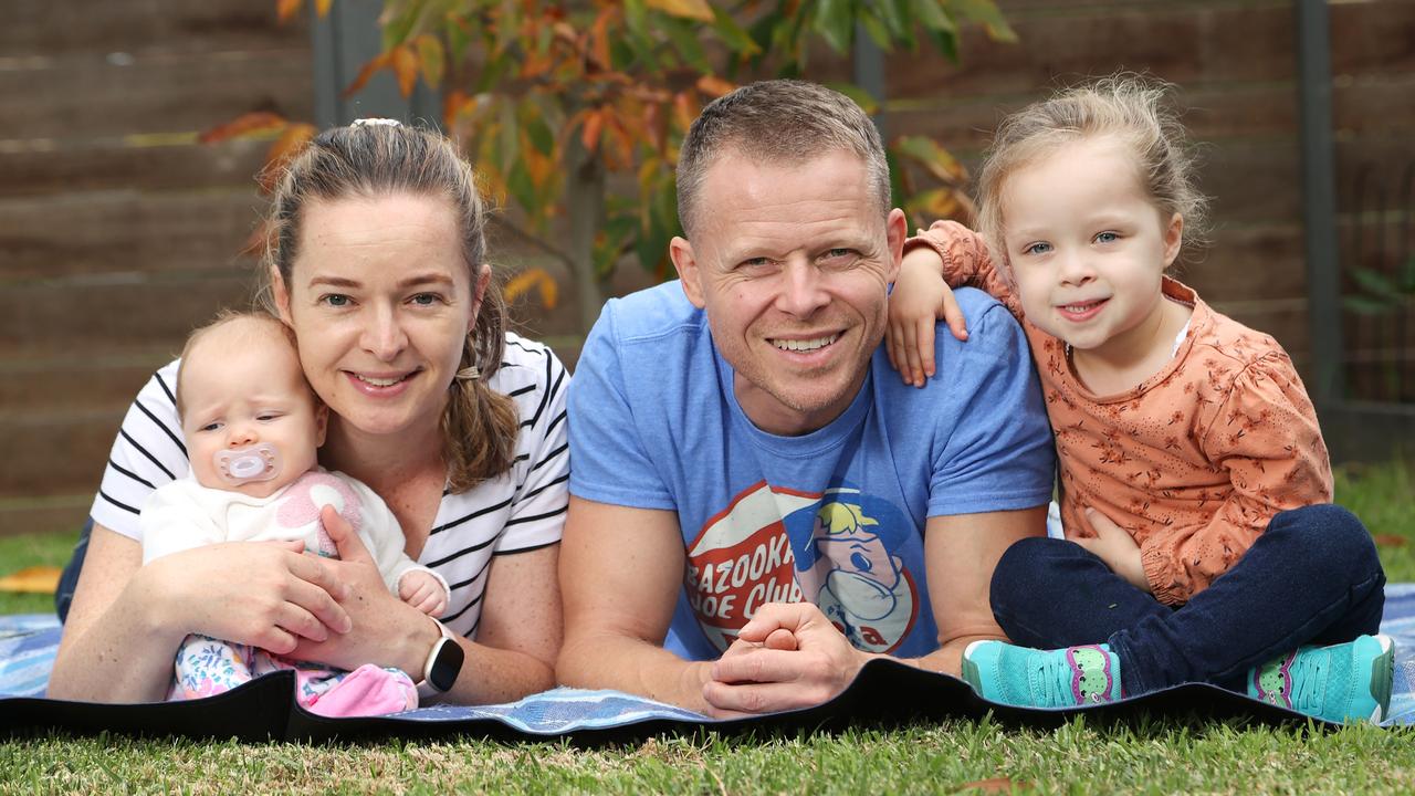 Teacher Andi Carlisle, 36, and husband Mark Carlisle, 47, who is a personal trainer and have two kids, nine week old Amarra and three year old Selena. Andi is the only member of the family with hospital cover. Picture: Andrew Tauber