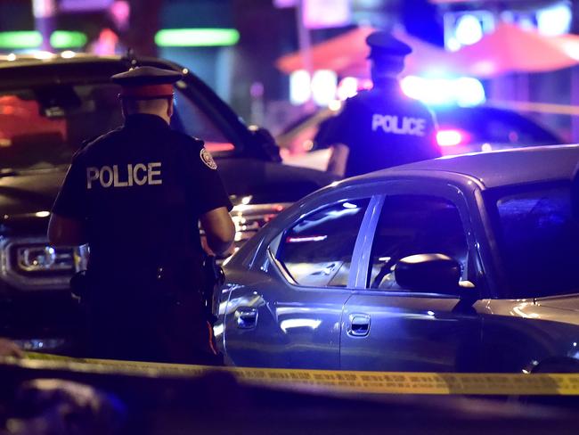 Police work the scene of a shooting in Toronto. Picture: AP