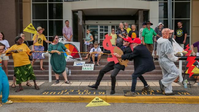 Anti-fracking activists dressed as gas executives lost dramatically to a crowd of “people-power” in a game of tug of war. Picture: Pema Tamang Pakhrin