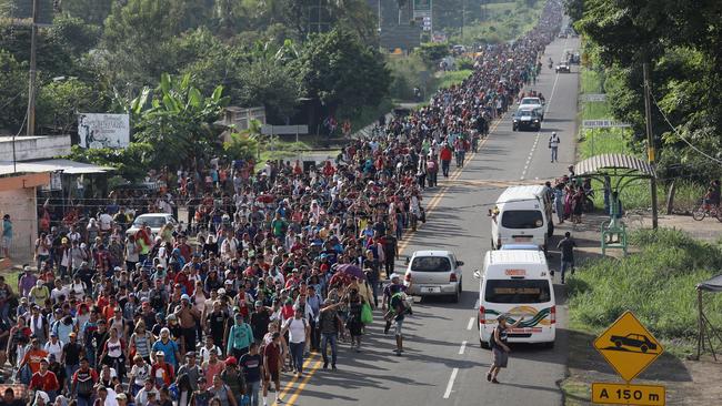 The migrant caravan crosses into Mexico at Ciudad Hidalgo. Picture: Getty Images