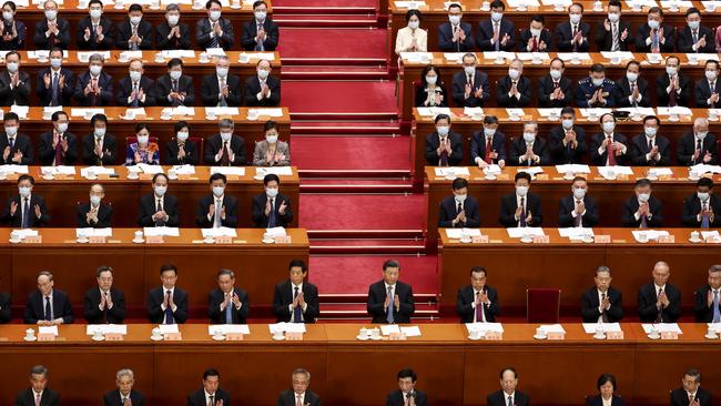 Chinese President Xi Jinping, centre, at the opening of the first session of the 14th Chinese People's Political Consultative Conference. Picture: Getty Images