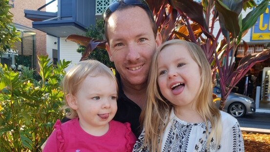 Travis Foley with his children.