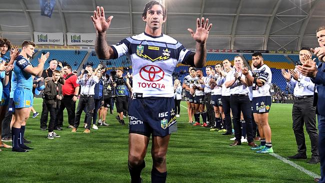 Johnathan Thurston farewells fans as he celebrates his last NRL match. Picture: Bradley Kanaris