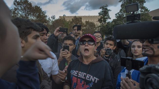 Supporters of Trump and Yiannopoulos argue with protesters. Picture: AFP