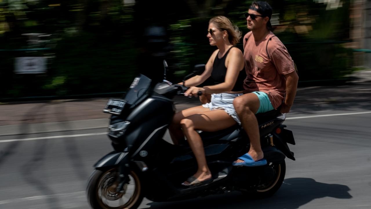 Indonesia’s Deputy Tourism Minister says foreign visitors need a motorbike license, must use authorised rental operators and wear a helmet. Picture: Agunng Parameswara/Getty Images