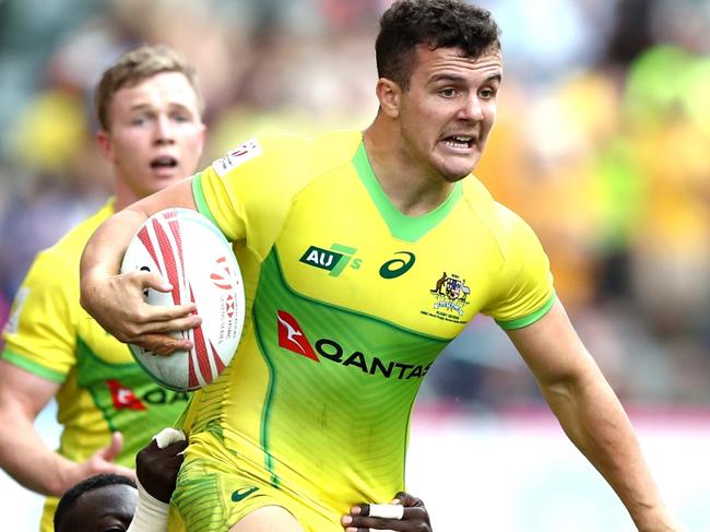 HONG KONG, HONG KONG - APRIL 06: Dylan Pietsch of Australia charges forward against Kenya on day two of the Cathay Pacific/HSBC Hong Kong Sevens at the Hong Kong Stadium on April 06, 2019 in Hong Kong. (Photo by Hannah Peters/Getty Images)