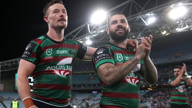 Adam Reynolds celebrates Souths’ win over the Roosters with Damien Cook. Picture: Cameron Spencer/Getty Images