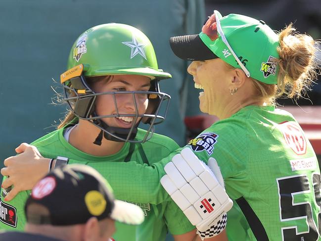 SYDNEY, AUSTRALIA - NOVEMBER 02: Tess Flintoff of the Stars is congratulated by team mates after scoring her half century during the Women's Big Bash League match between the Adelaide Strikers and the Melbourne Stars at North Sydney Oval, on November 02, 2022, in Sydney, Australia. (Photo by Mark Evans/Getty Images)