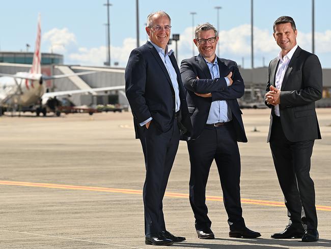 The men that saved Virgin: (left to right) John Greig , Richard Hughes and Sal Algeri , from Deloitte Australia are three of the four Voluntary Administrators of Virgin Australia, at Brisbane airport Picture: Lyndon Mechielsen