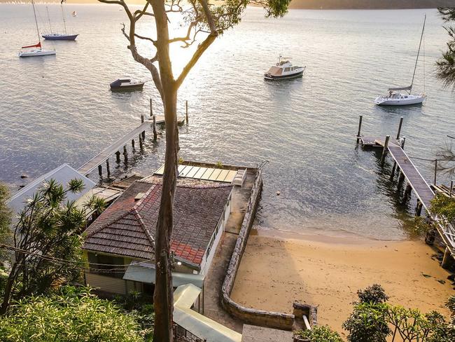 The Avalon Beach home comes with its own private patch of sand.