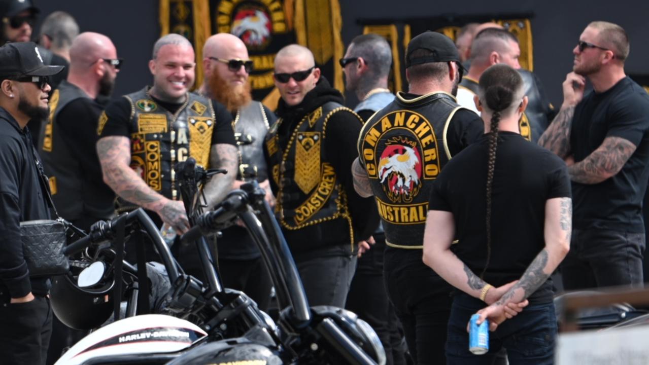 Feared bikie gang snaps selfies with cops