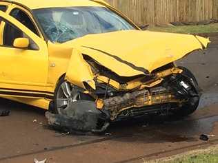 EMERGENCY services are working to free a motorist trapped in a vehicle after a serious crash in the Toowoomba CBD. . Picture: Bev Lacey