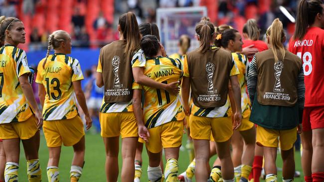 Australian players trudge off following their loss to Italy. Picture: AFP