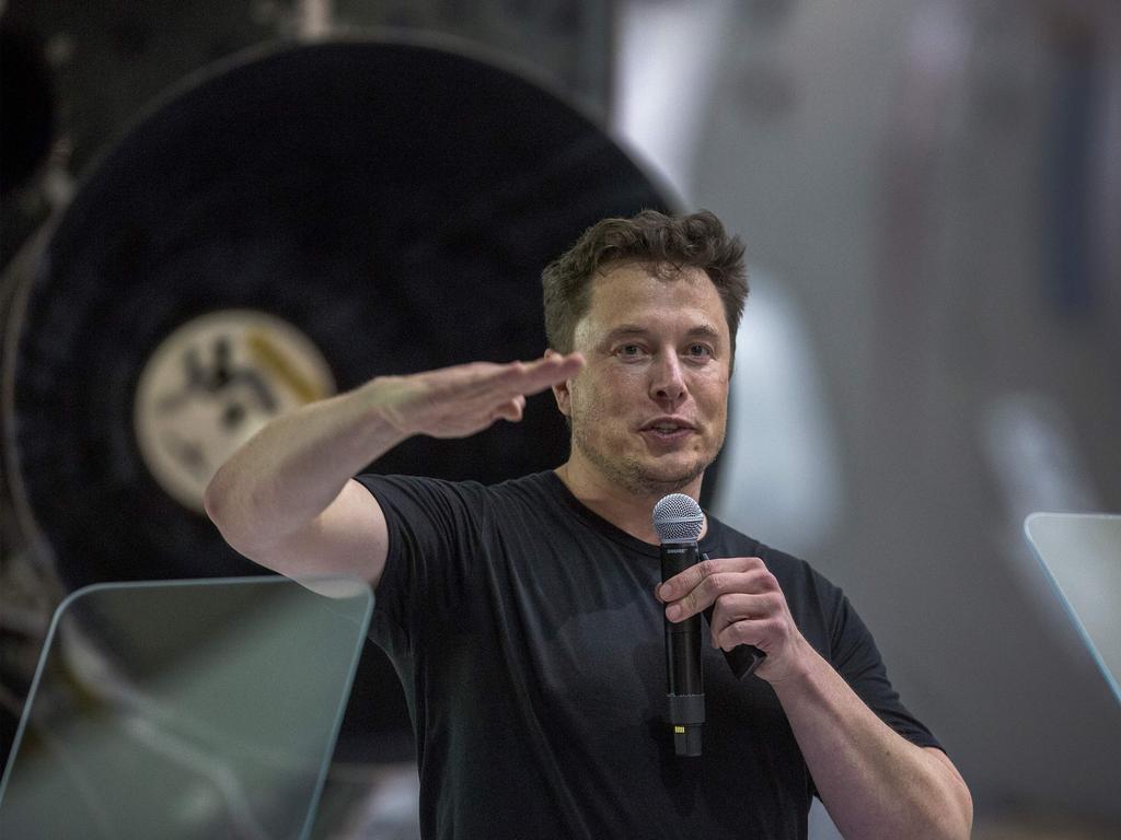 Elon Musk speaks near a Falcon 9 rocket during his announcement that Japanese billionaire Yusaku Maezawa will be the first private passenger who will fly around the Moon aboard the SpaceX Starship. Picture: AFP
