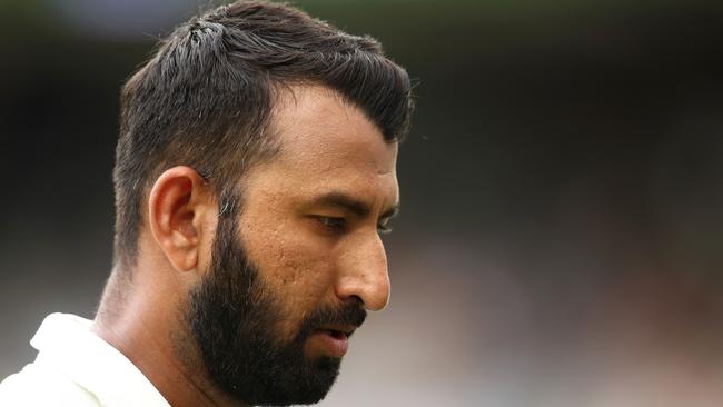 Cheteshwar Pujara struggled after his Adeliade heroics. (Photo by Cameron Spencer/Getty Images)