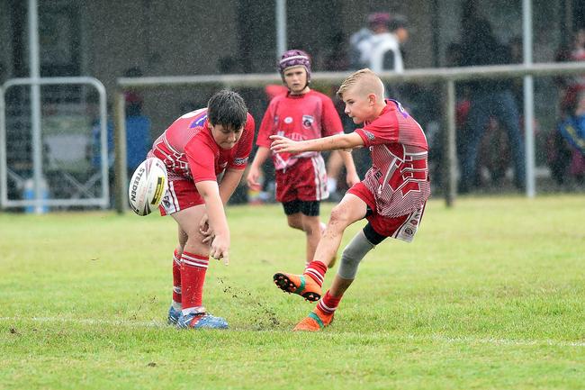 Rory Crumpton (right) kicks off an under-12 match for the Kingaroy Ants back in 2019.