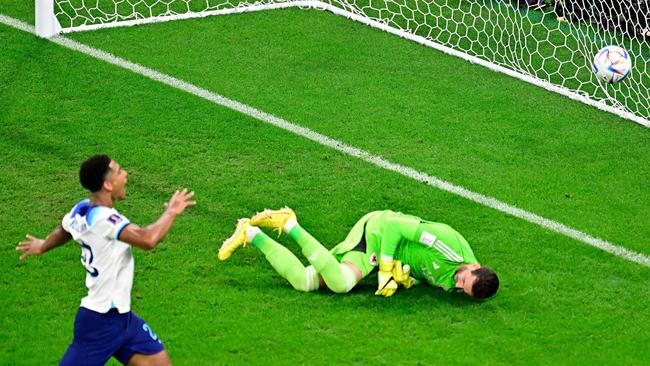 Wales' goalkeeper #12 Danny Ward (R) concedes a goal by England's forward #11 Marcus Rashford (L) from a free-kick. Picture: Javier Soriano/AFP