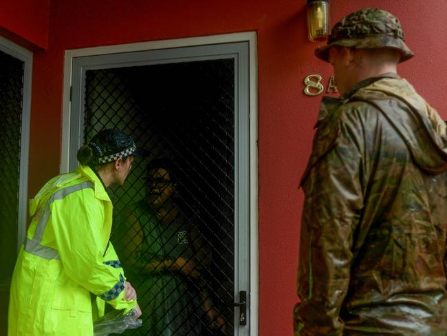 Australian Army soldiers from 3rd Battalion, Royal Australian Regiment, prepare to support the Queensland Police Service during severe weather in Townsville to ensure the safety of residents in high-risk areas. PHOTO: CPL Riley Blennerhassett