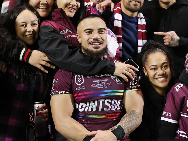 SYDNEY, AUSTRALIA - JULY 28:  Alfred Smalley of the Sea Eagles poses with family and friends after the round 20 NRL match between the Manly Sea Eagles and the Sydney Roosters at 4 Pines Park on July 28, 2022, in Sydney, Australia. (Photo by Cameron Spencer/Getty Images)