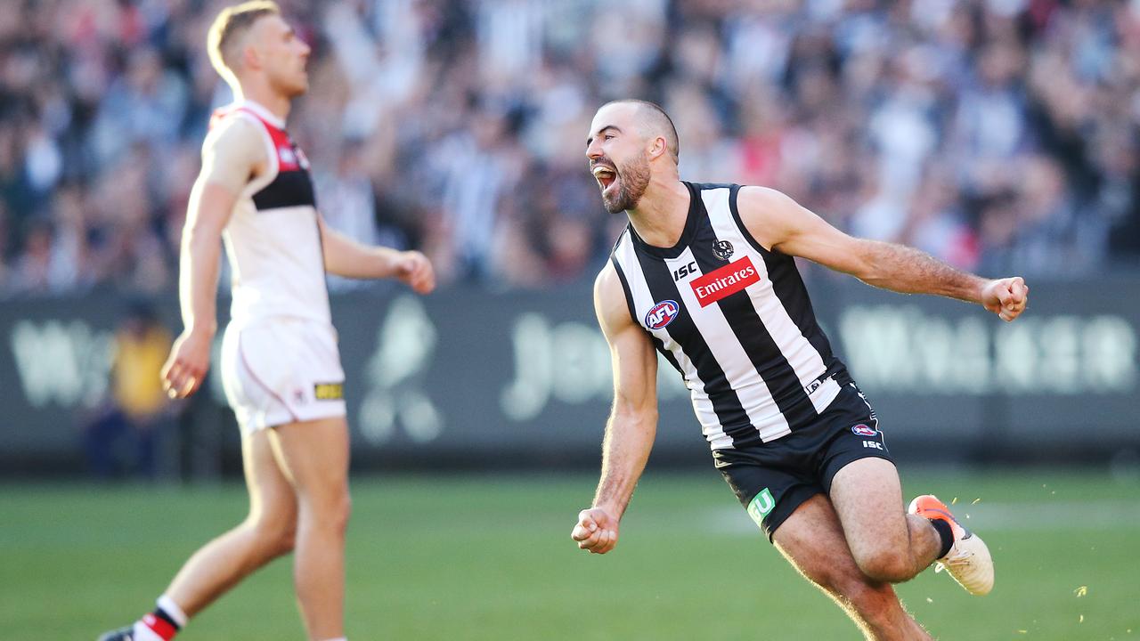 Steele Sidebottom of the Magpies celebrates a goal during Round 9