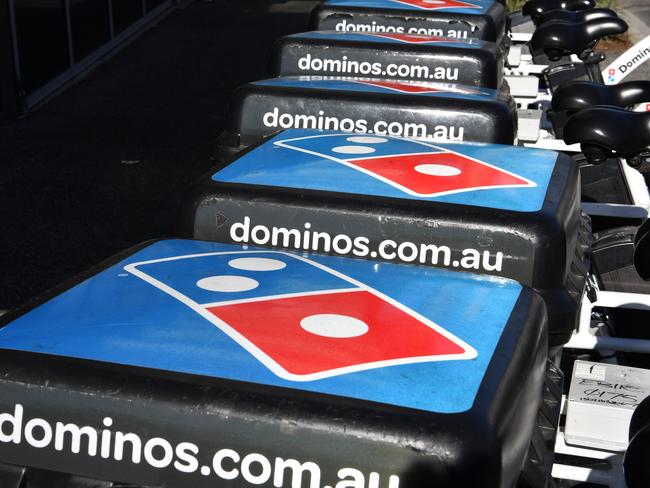 Domino's Pizza might be making many deliveries, but the profit on each pizza is low. Picture: Darren England / AAP