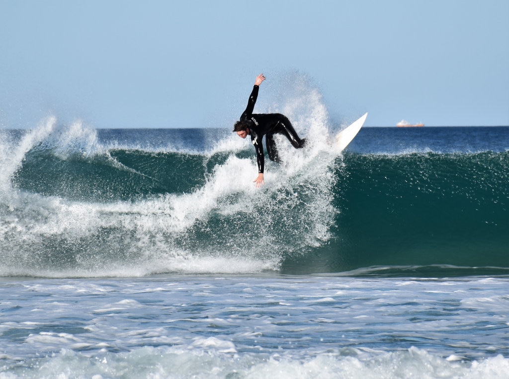 Surfers and bodyboard riders making the most of the waves at Kawana on the weekend. Picture: Mark Furler