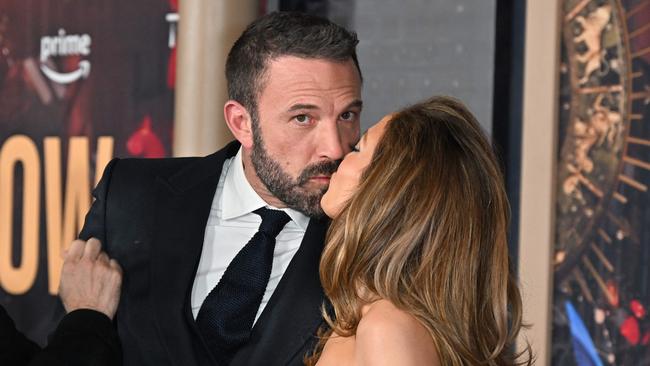 Ben and J Lo share a kiss on February 13. Picture: AFP