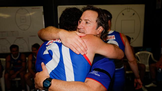 BALLARAT, AUSTRALIA - AUGUST 25: Luke Beveridge, Senior Coach of the Bulldogs hugs Tom Liberatore of the Bulldogs during the 2024 AFL Round 24 match between the Western Bulldogs and the GWS GIANTS at Mars Stadium on August 25, 2024 in Ballarat, Australia. (Photo by Dylan Burns/AFL Photos via Getty Images)