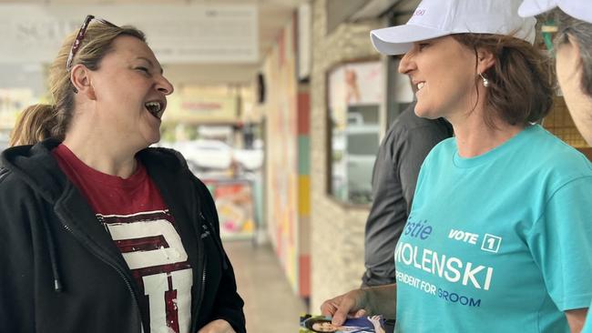 Independent candidate for Groom Kirstie Smolenski (right) chats with people on the street in Toowoomba.