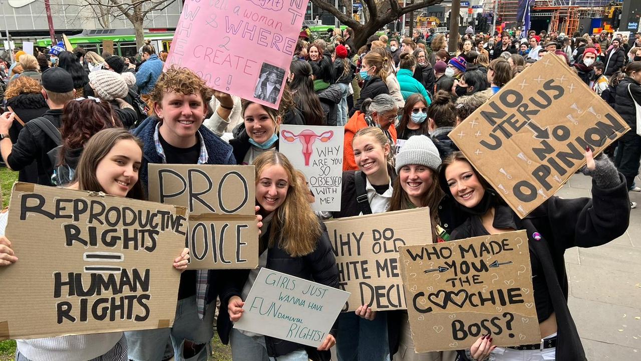 Many held homemade signs with strong messages. Picture: Chantelle Francis/ news.com.au