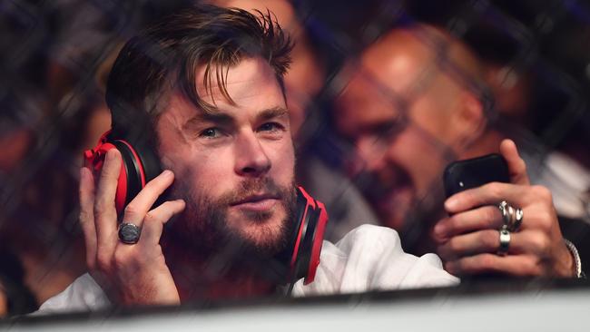 Chris Hemsworth sits ringside at the UFC234 at Rod Laver Arena. Picture: Quinn Rooney/Getty Images