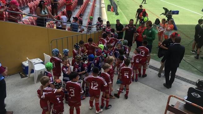 The Roma Saints Under 8s team speaking on television on Channel 9. Picture: Dolphins Rugby League.