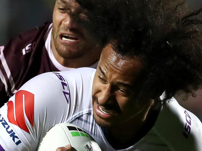 SYDNEY, AUSTRALIA - AUGUST 31: Felise Kaufusi of the Storm is tackled during the round 24 NRL match between the Manly Sea Eagles and the Melbourne Storm at Lottoland on August 31, 2019 in Sydney, Australia. (Photo by Cameron Spencer/Getty Images)