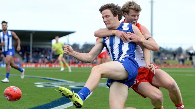 Jared Polec is tackled by Nick Blakey in Hobart during the Marsh Community Series. Picture: Steve Bell/Getty Images.