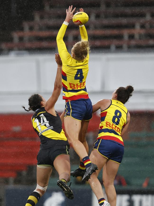 Zoe Prowse climbs high for an attempted mark. Picture: Darrian Traynor/AFL Photos/via Getty Images