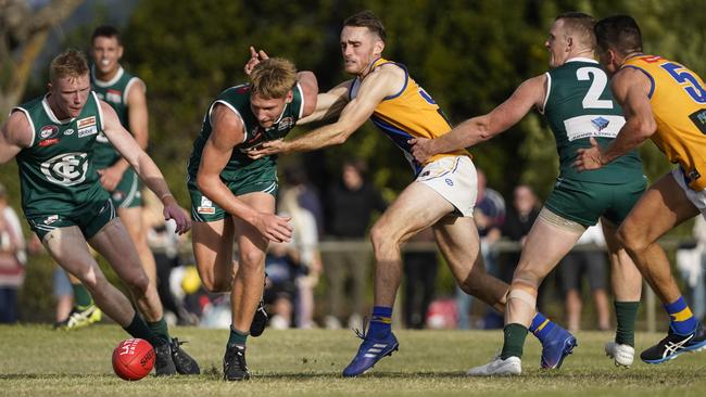 Angus Seivers wins the ball for Greensborough. Picture: Valeriu Campan