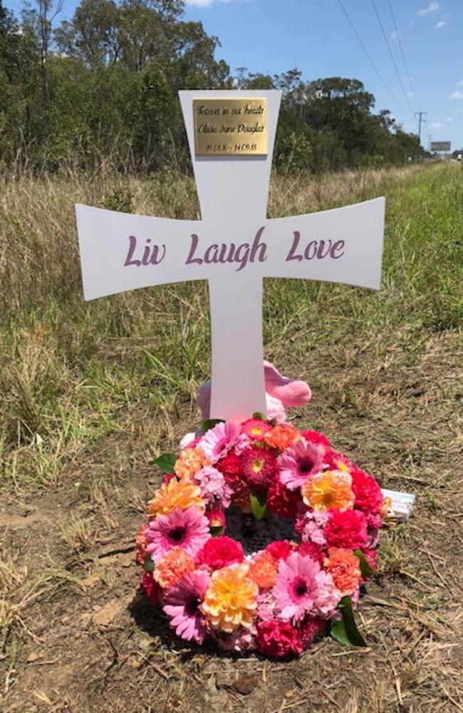 The cross on the side of the Bruce Highway, near Childers, where Olivia died.