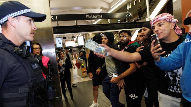 Pro-Palestine supporters rush at the police line at Sydney’s Circular Quay Station on October 9 last year. Picture: David Swift