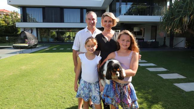 V8 Supercar driver Paul Weel and his wife Emma, with daughters Mila 8 and Abby 10, at the home they sold for $10.9 million. Picture Glenn Hampson.