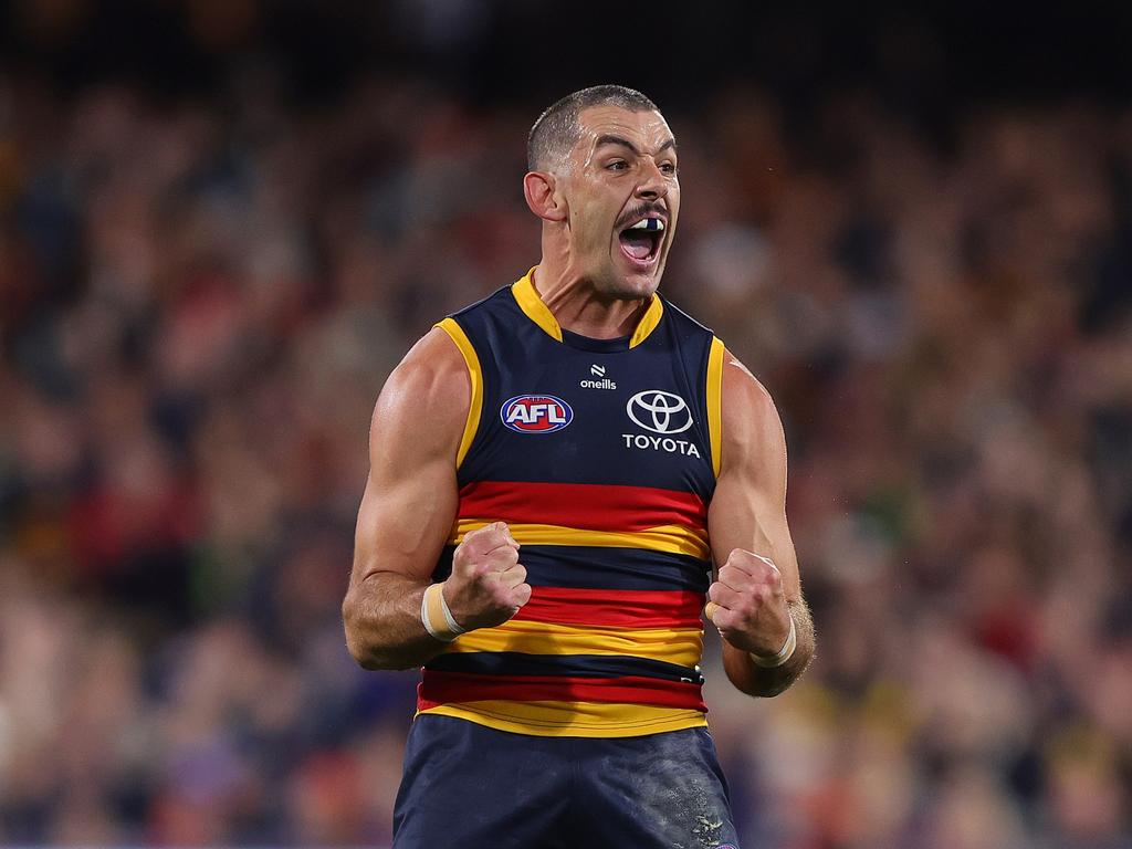 Taylor Walker fires up after a goal. Picture: Sarah Reed/AFL Photos via Getty Images