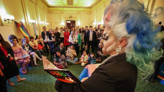 A drag queen reads an inclusive story book to some children and parliamentary staff in federal parliament. Picture: David Caird