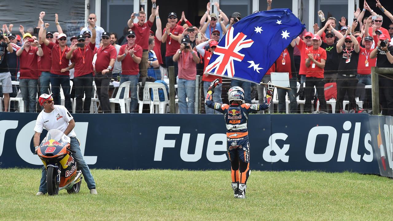 Jack Miller celebrates winning the Moto3 race at Phillip Island in 2014. Picture: Paul Crock