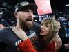 Swift, NFL star kiss after recordbreaking act